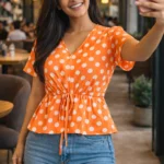 orange polka dot bell sleeve peplum top for women